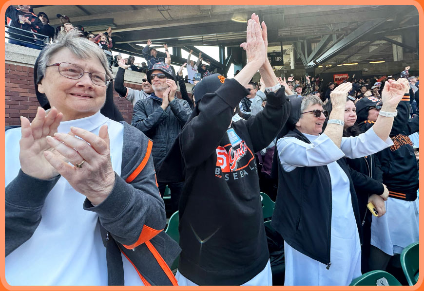 Sisters enjoying grand slam at Giants game